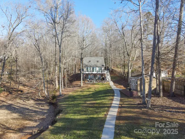 Aerial Views of Exterior Back of Waterfront Home!