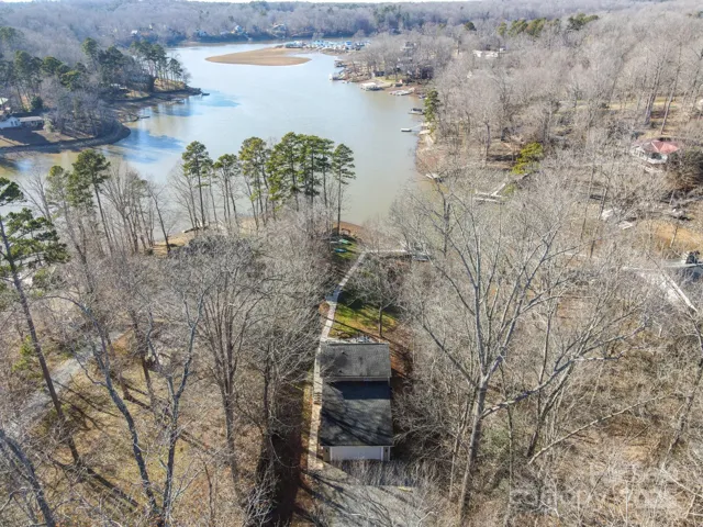 Aerial Views of Beautiful, Waterfront, 2 Story/Basement, 3 Bedroom, 3 Bath Home with private pier/dock located on 3.51 acres of ultra private, gorgeous, wooded land!