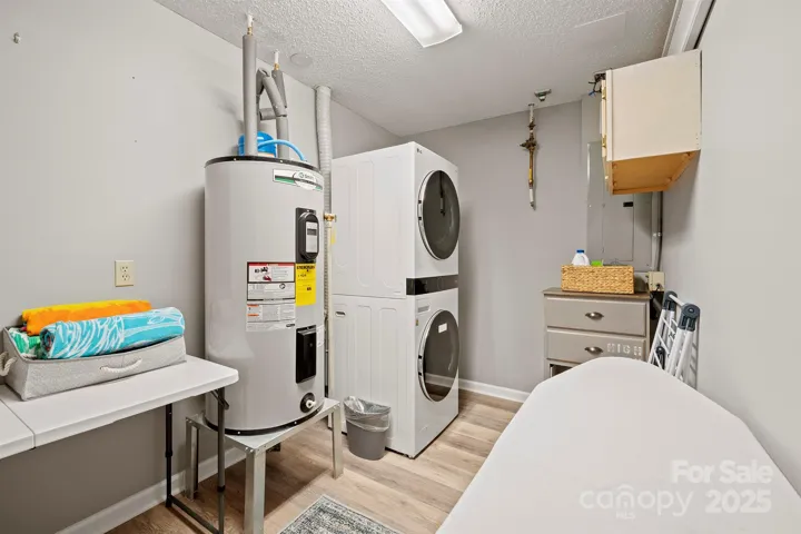 Basement level Laundry Room with washer/dryer to remain with Buyer!