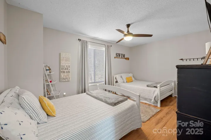 Spacious Bedroom on main level with ceiling fan/light & LVP floors!