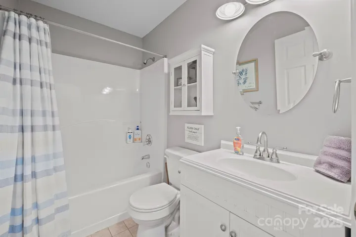 Full Bath on main level with tub/shower & tile floors!