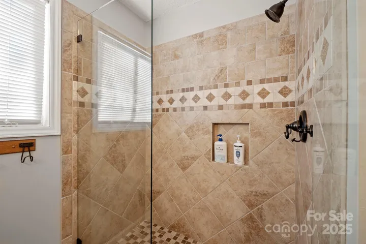 Custom, Tiled shower with frameless glass!