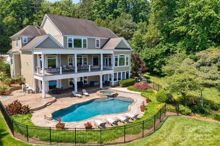 Beautiful backyard featuring saltwater inground pool.