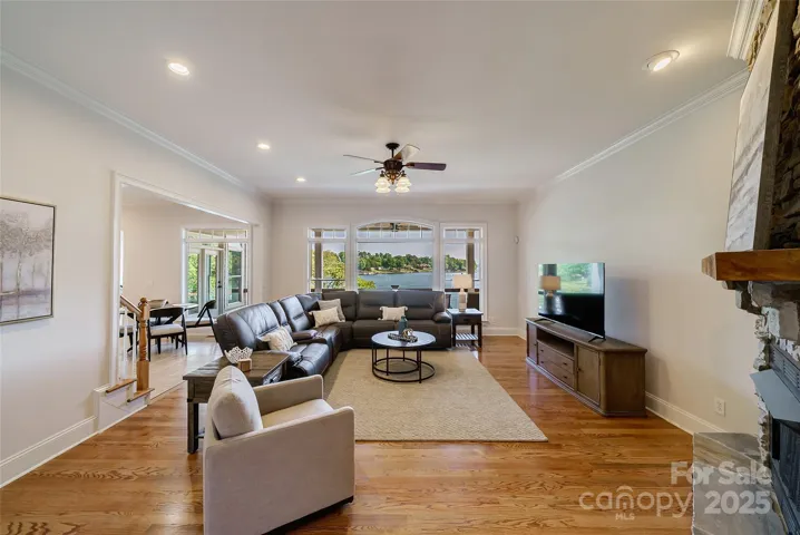 Very inviting main level Great room with a wall of windows with Lake Views!