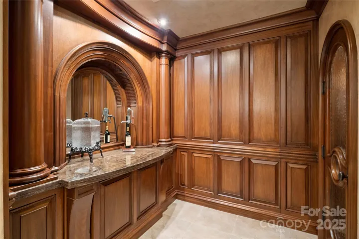 Stunning Millwork with hidden door
