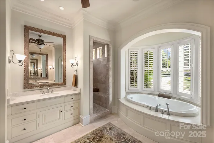 Primary Bath with Marble Floors and counters