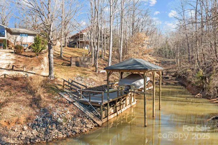 Private dock with 6000 lb boat lift. Boat included!