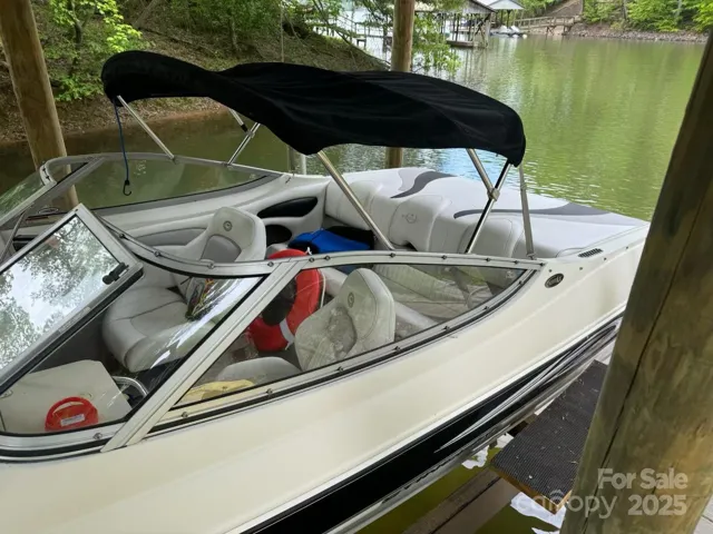 2008 Stingray boat conveys with the house