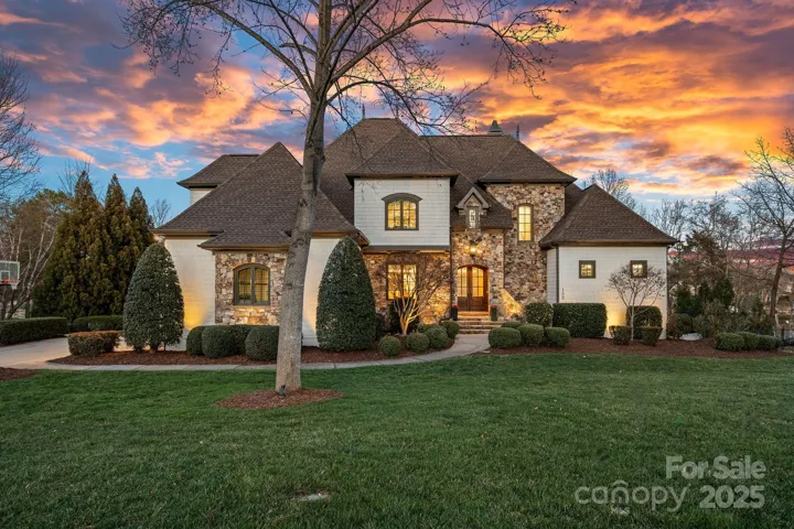 Custom home located on one of the most sought after streets in the Point