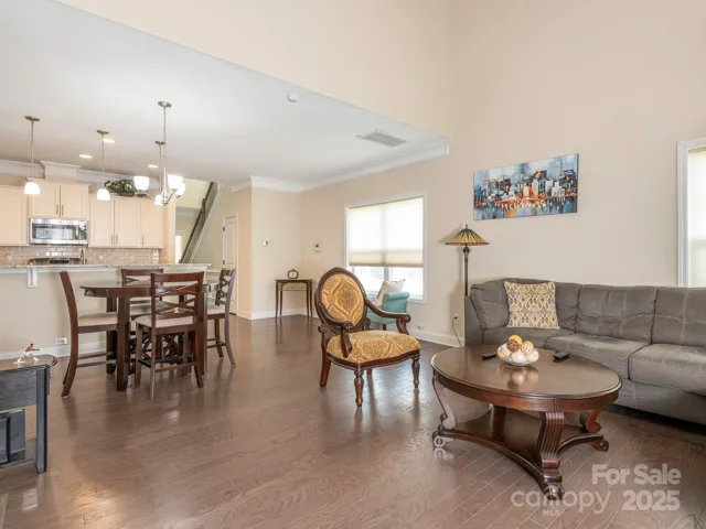 Living Room into Dining and Kitchen
