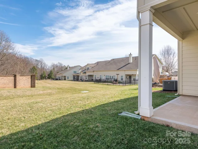 Covered back patio and backyard