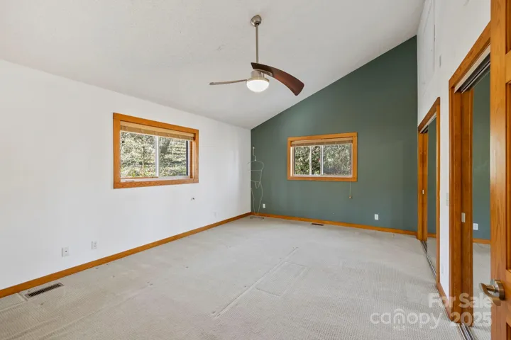 Primary bedroom- newer ceiling fan/light