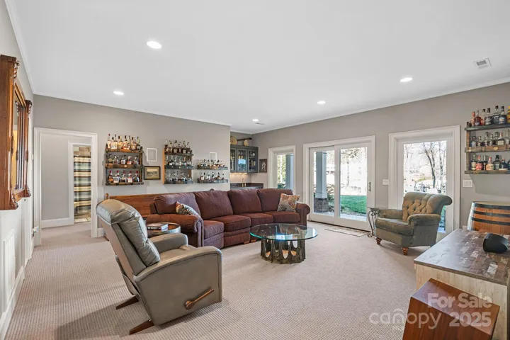 Bonus room in walk-out basement with lake views and access to covered patio.