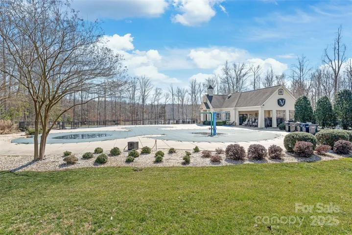 One of two community pools with splash pad.