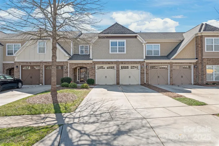 Spacious garage and driveway. Beautiful details.