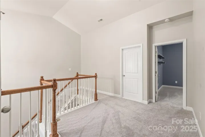 Closed door leads to large storage space!