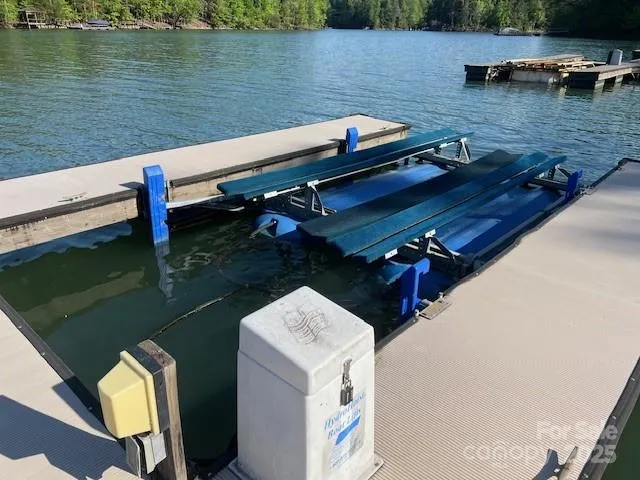 Deeded boat slip with lift in community docks