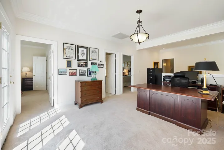 The loft with access to balcony is perfect for office, den, or paly area