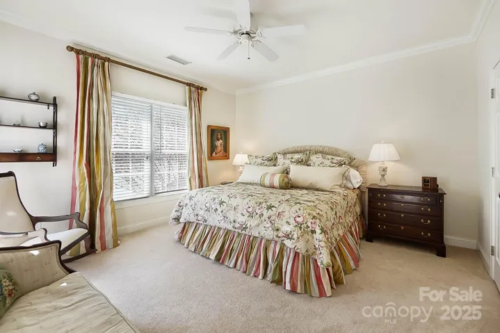 Spacious bedroom with private access to balcony