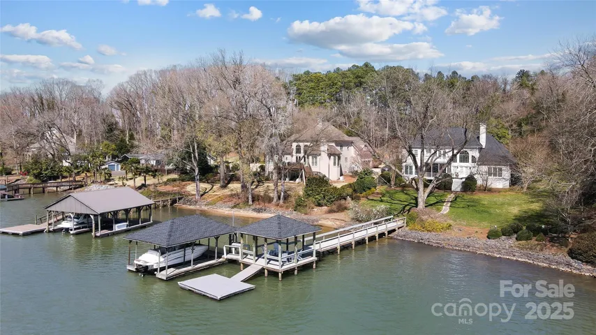 This exceptional estate offers a coveted Charlotte location, providing the perfect balance of tranquility and convenience