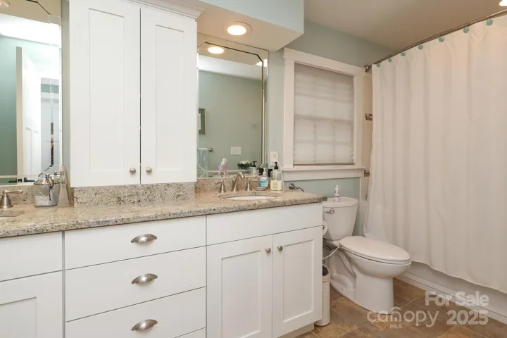 Carriage/Guest house full bath on main floor