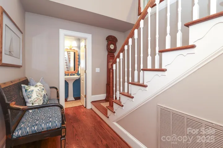 Second staircase and main floor powder bath