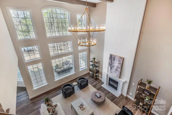 Grand foyer viewed from above, showing dramatic height and openness.