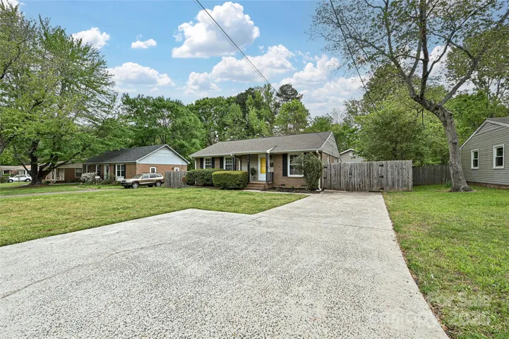 double parking in front of private, fenced driveway