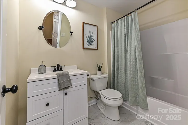 Hall bathroom totally updated with new tile floors