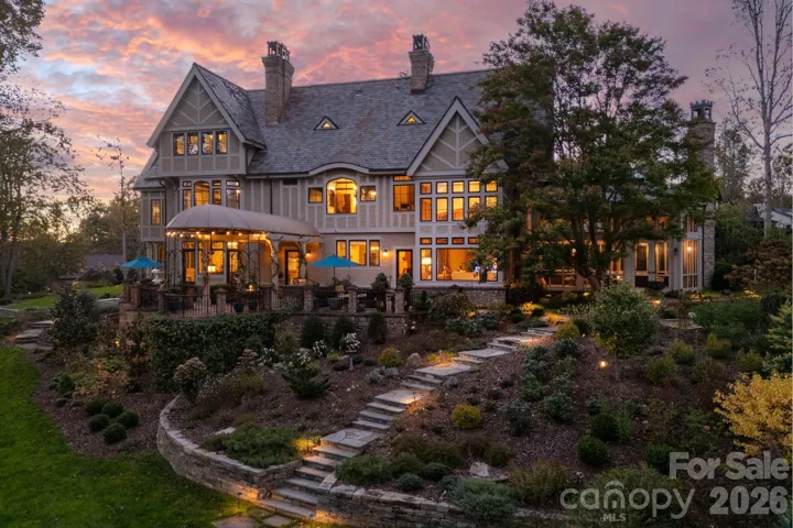 Nestled on a hill with easy slope of lawn.  Ideal for outdoor games.