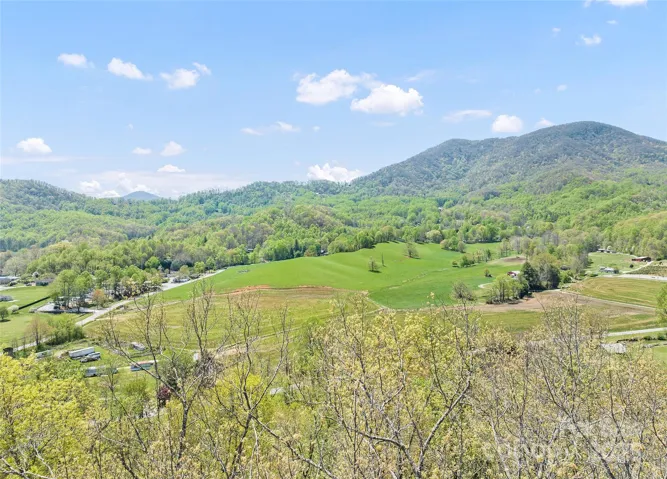 THis view is inside and out. Pastoral & long range mountain
