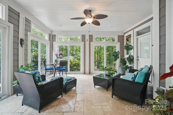 Sunroom off the kitchen and dining area