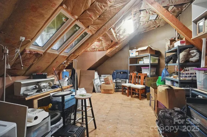 Large walk in attic with storage