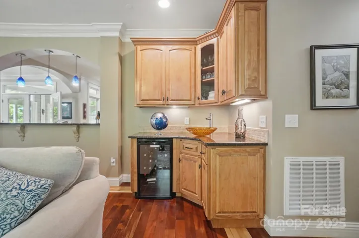 Wet bar and wine cooler in living room