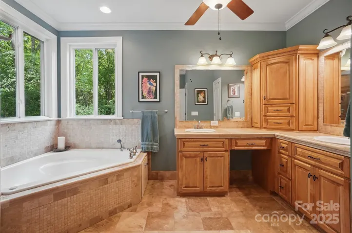 Primary bathroom with whirlpool tub and large walk in shower