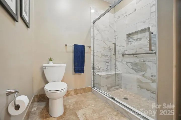 Full bath with walk in shower on main level