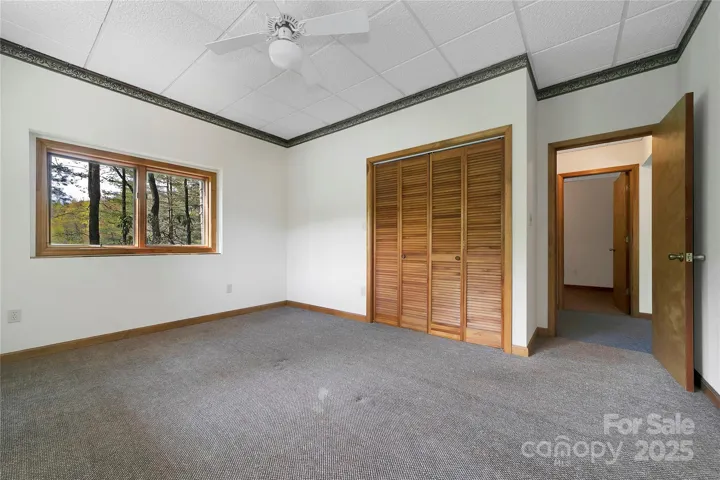 Lower level bedroom has lake view