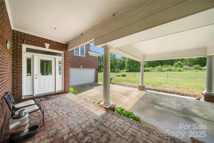 port cochere style carport and wrap around porches