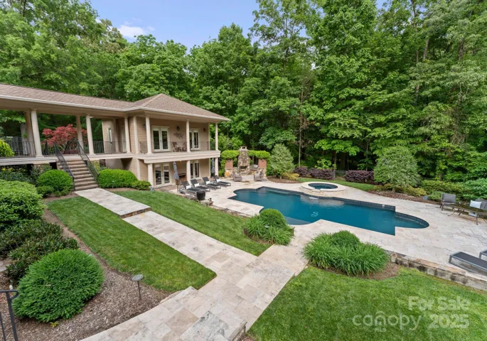 Glance from Back porch at pool and pool house