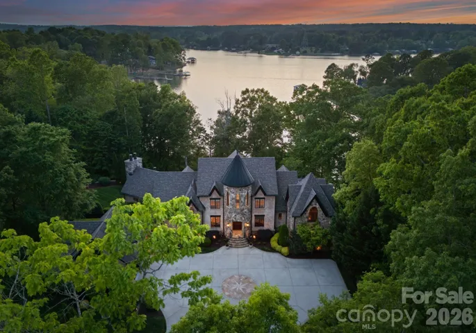 Aerial view of the home featuring stunning views of Lake Norman.