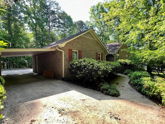 Driveway - Porte-cochere leading to rear entry garage