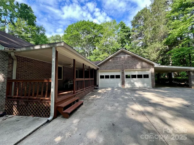 Rear Load Garage, Driveway, Covered Porch and Porte-cochere