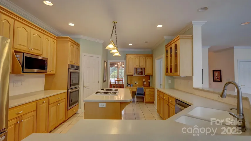 Massive kitchen with tons of quality cabinets and counterspace