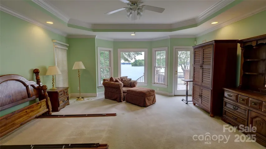 Main Level Primary Bedroom with waterview