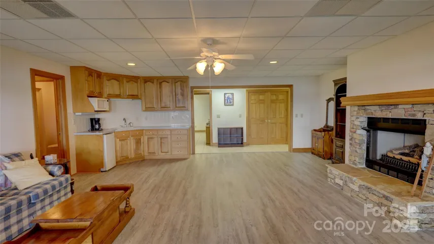 Basement great room with huge views, fireplace and kitchenette