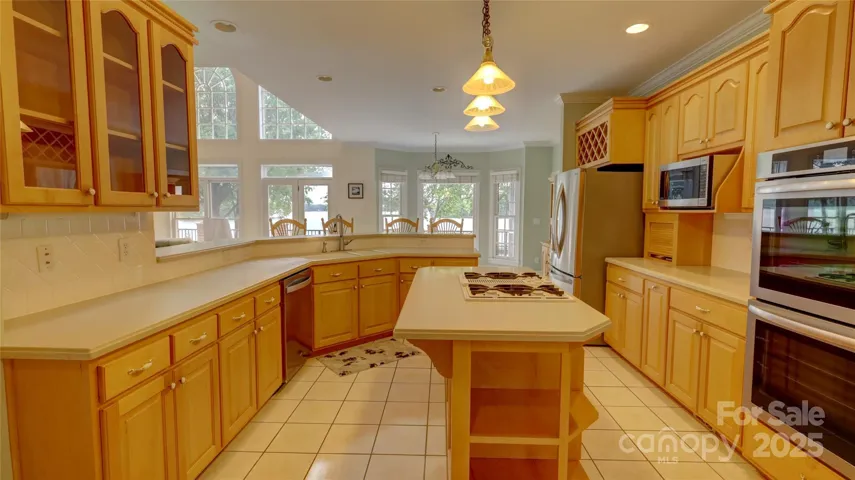 Massive kitchen with tons of quality cabinets and counterspace
