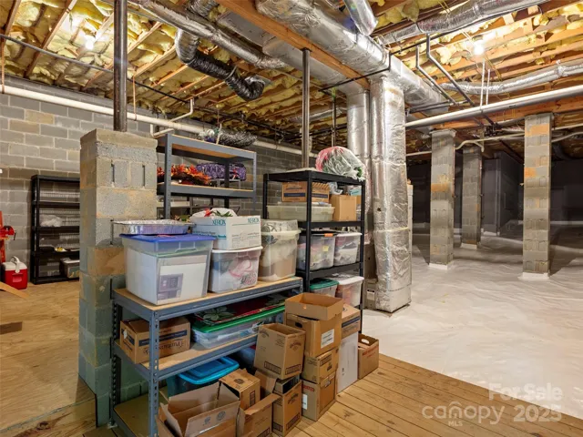 Floored Storage in Crawl with Spigots added to Drain Pipes if desired while traveling