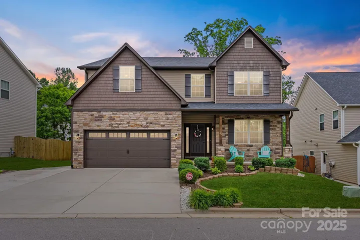 Stunning 5-bed/2.5-bath craftsmanstyle home nestled in Arden's premier Balsam Ridge.