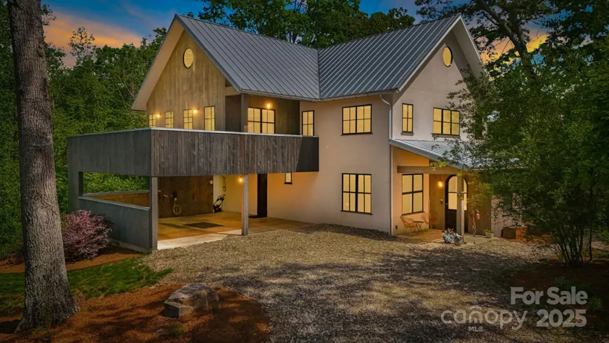 Welcome Home!   Twilight View of this Amazing Modern Luxury Farmhouse in the Olivette CommUnity!