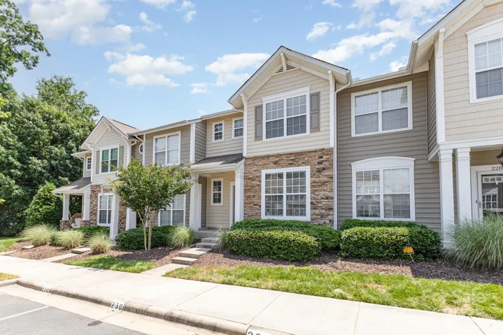 Townhome sits at the end of the street, with 2 parking spots for the townhome. Other guest parking is available as well.